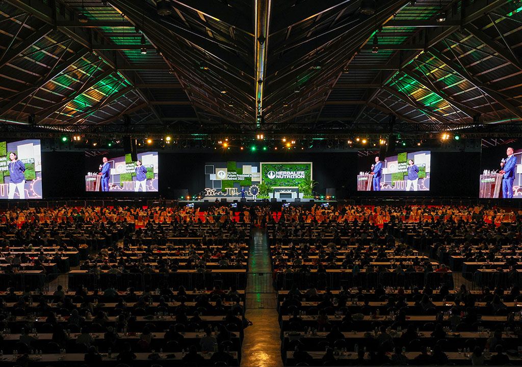 Bangkok Photographer Convention photography Herbalife stage with 18,000 attendees watching screens at Exhibition Centre