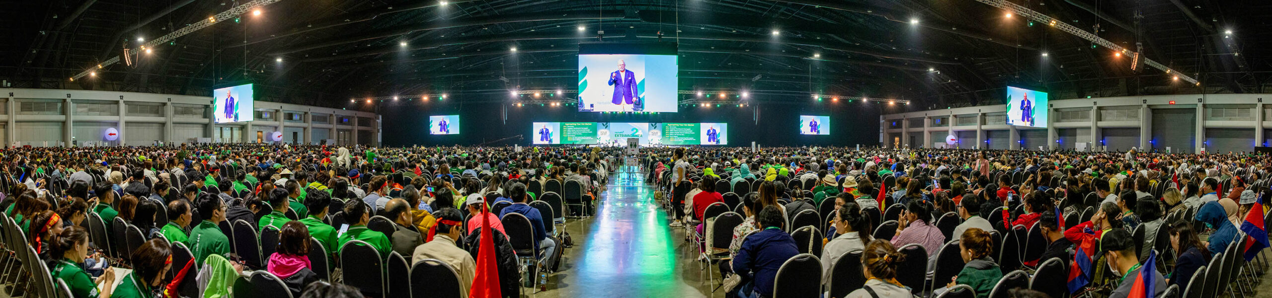 Event photographer in Thailand at a convention with attendees